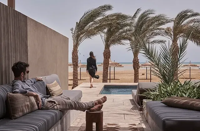 Couple enjoying Junior Suite shared pool