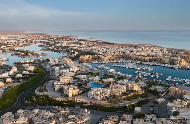 Aerial view of El Gouna's lagoons, marina and waterfront buildings along the Red Sea coast