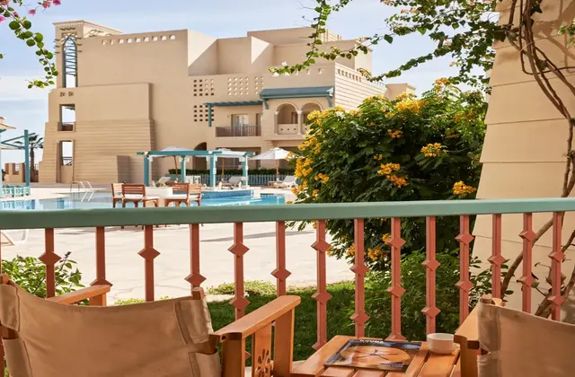 The terrace overlooking the pool at Mosaique Hotel.